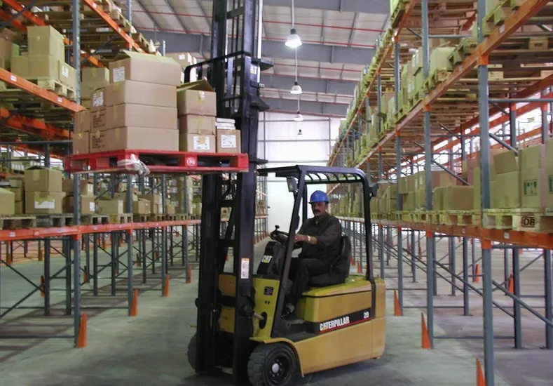 Warehouse floor operations where goods and storage locations are identified by scanning